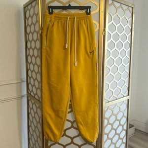 Yellow Nike dry fit joggers